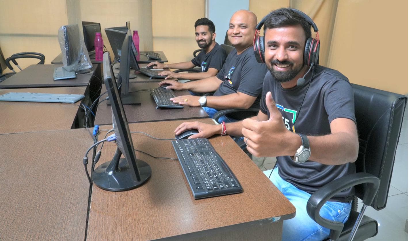 F5 India team members working at their stations in the Pune office.